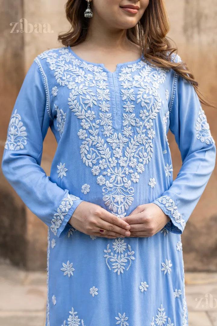 Close-up of Blue Chikankari Kurta featuring intricate white embroidery, showcasing traditional craftsmanship and timeless elegance.